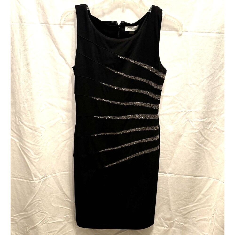 Calvin Klein sleeveless black sheath dress with gold accents size 4